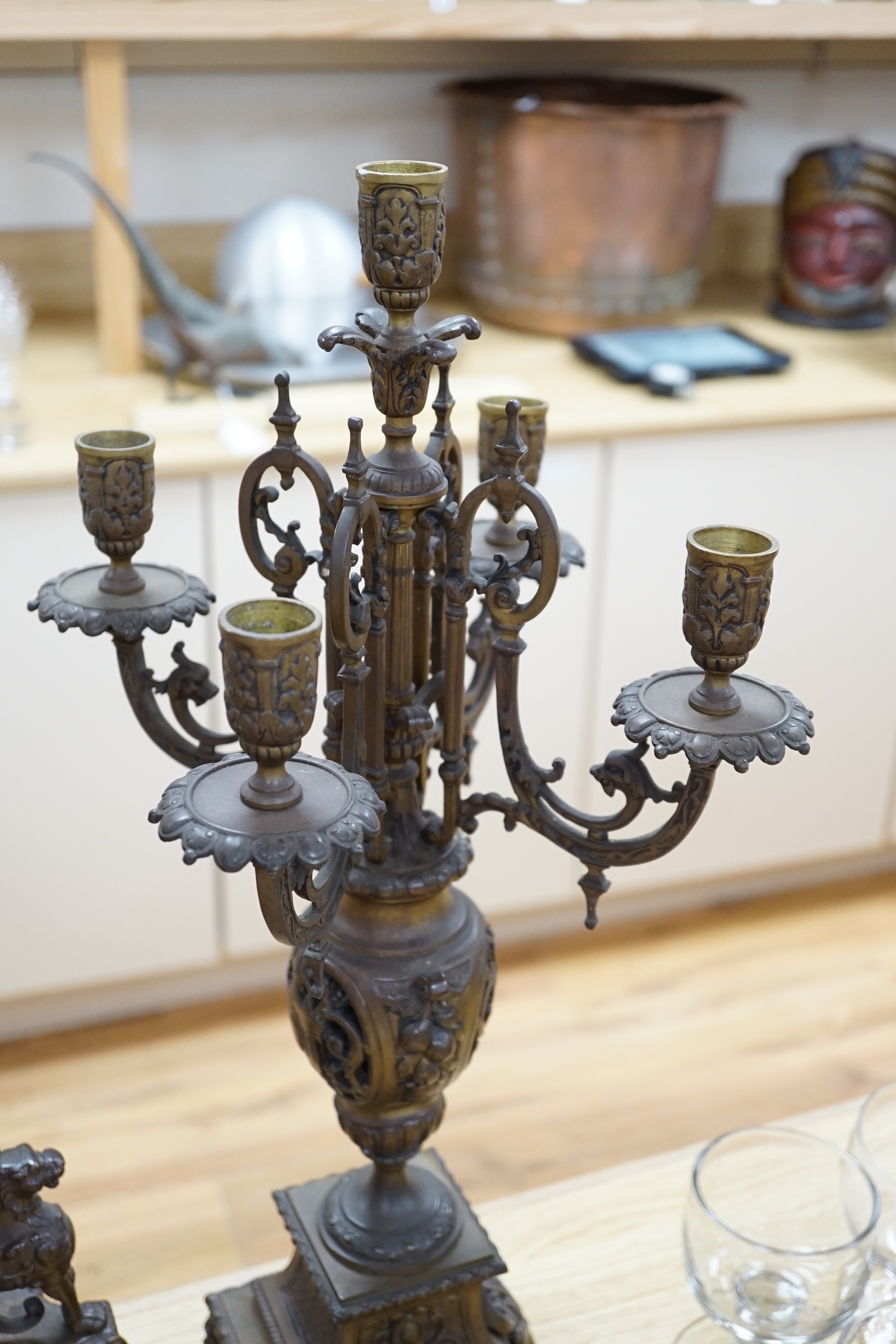 An ornate French bronze clock and five light candelabra garniture, late 19th century, 57cm high